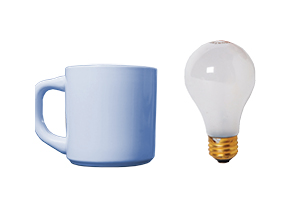 a lightbulb and a ceramic mug