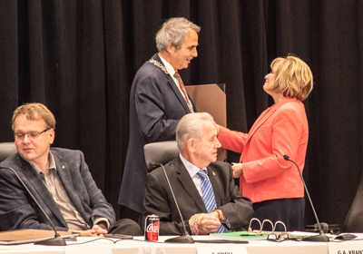 Halton Regional Chair Gary Carr thanks Regional Councillor Blair Lancaster for her service by shaking her hand.